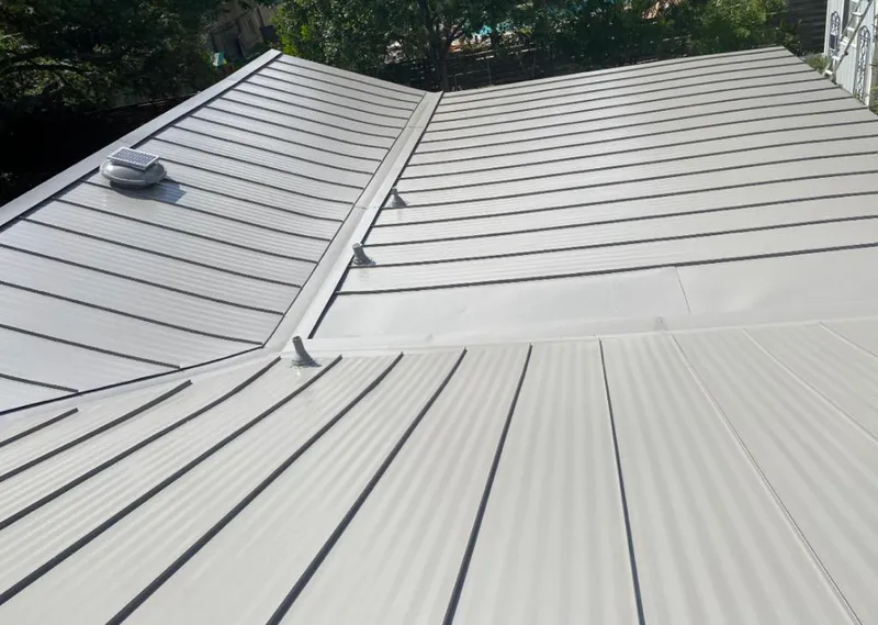 Solar attic fan installed on a metal roof for Roof Ventilation in Los Altos Hills